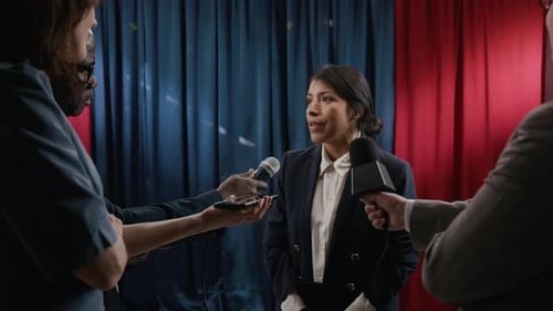 Hispanic Woman Politician Speaking to Reporters at Press Conference