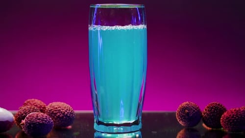 Blue Drink Surrounded by Lychee Fruit