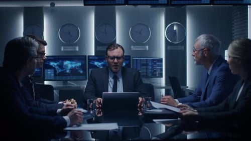 Business People Meeting in Dark Corporate Conference Room