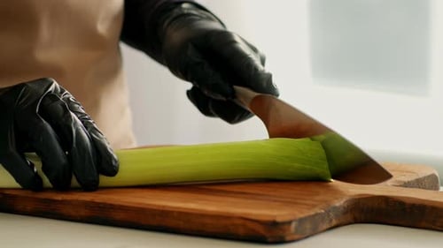 Chef Preparing Fresh Vegetables in a Kitchen Environment for a Healthy Meal