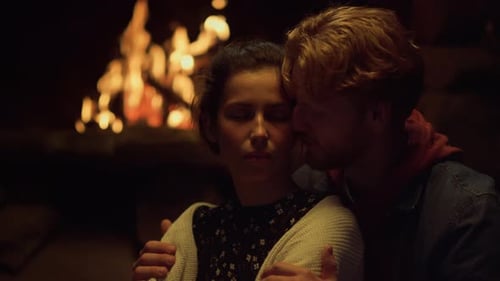 Relaxing Couple Embrace Touch by Fireplace Vacation House. Close Up Sensual Boyfriend