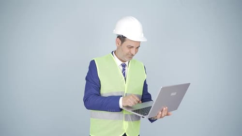 Engineer waving at camera.