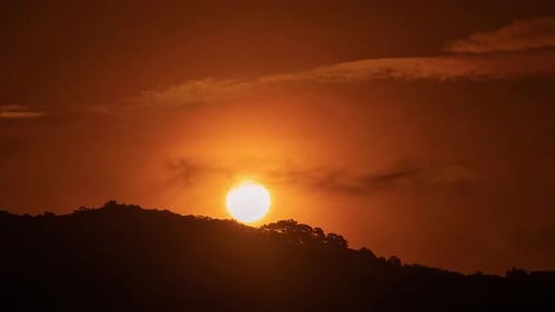 Golden Sunrise Over Mountain Time-Lapse