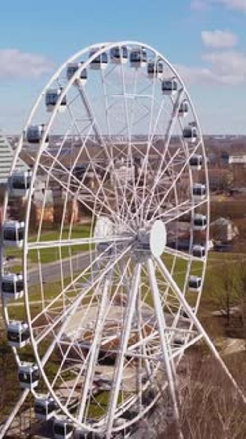 Ferris Wheel Aerial View in Urban Cityscape