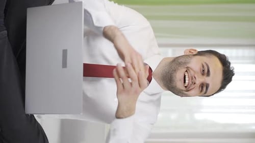 Man With Laptop Celebrating Online Win