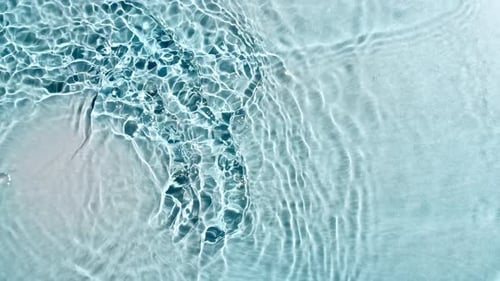 Abstract Rippling Light on Water Surface