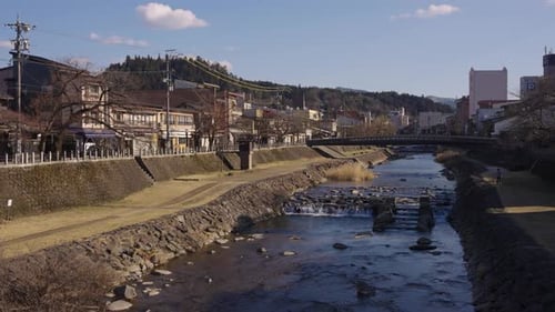 Warm Afternoon in Takayama, Gifu Japan. Traditional Bridges and River Through Town