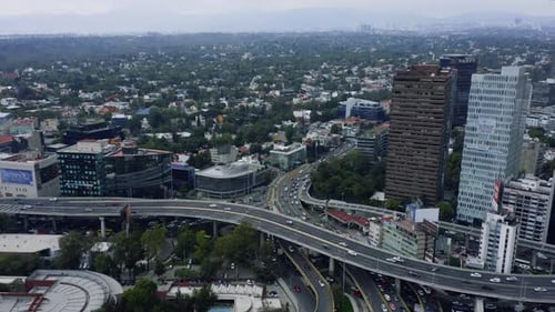Urban Hustle: Aerial View of a Bustling City Avenue