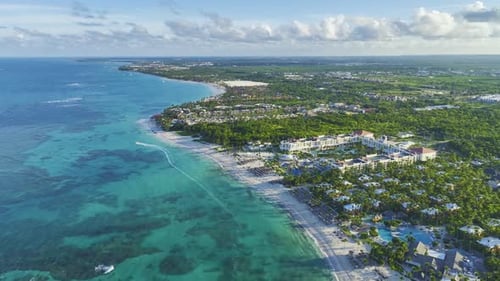 Aerial View of Tropical Beach Resort and Turquoise Ocean Paradise