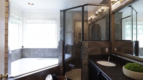 Luxurious Bathroom with Granite Vanity and Shower
