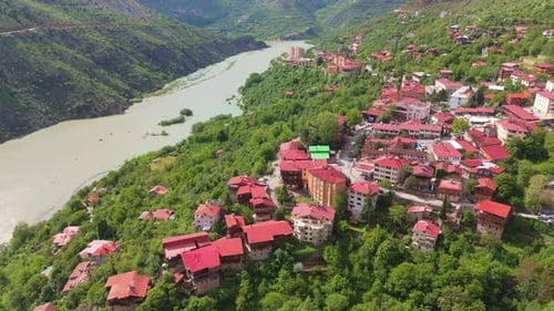 Aerial of Kemaliye town nestled along the winding Euphrates River valley. travel destination in