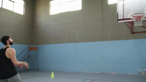 Basketball Players Train In The Indoor Court Before The Match