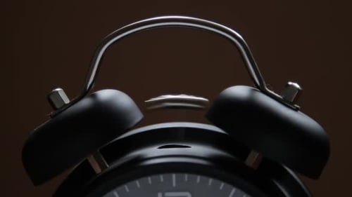 Old Fashioned Alarm Clock Ringing on the Hour