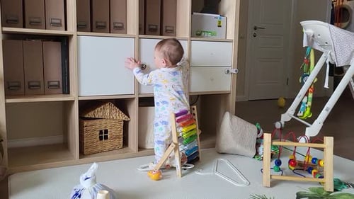 Curious Toddler Exploring at Home