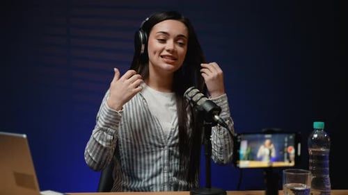 Woman Recording Podcast in Home Studio