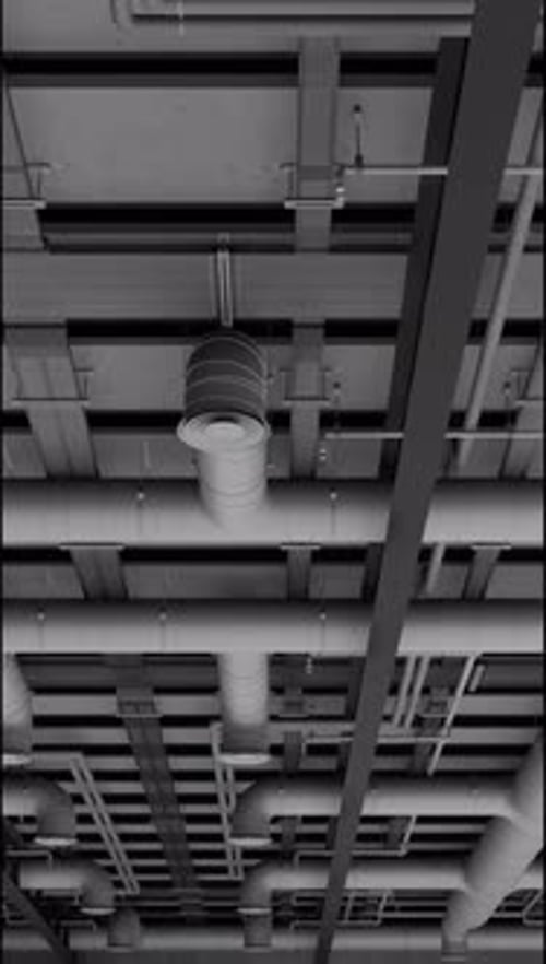 Electrical and ventilation systems, connections with cables and metal pipes inside a modern building