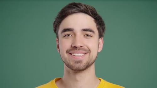 Friendly Bearded Young Man Smiling Confident Happy Guy On Green Background