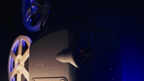 Vintage 8Mm Film Projector Rotating Reels Nostalgic Charm of Classic Cinema