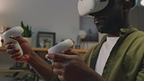 Man Experiences Virtual Reality With VR Headset