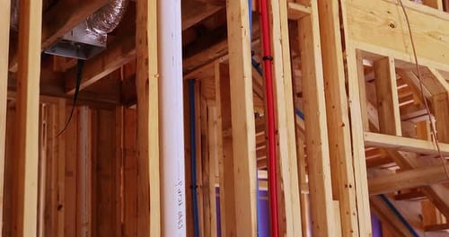 New Home Construction Site Interior with Pipes