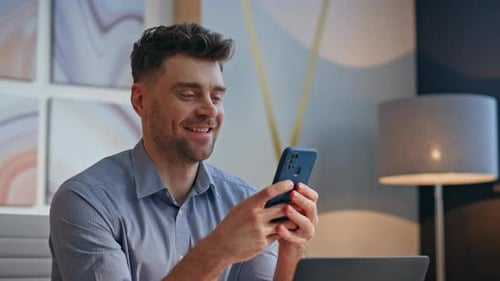 Happy Businessman Messaging Cellphone Enjoy Break Sitting Office Desk Closeup