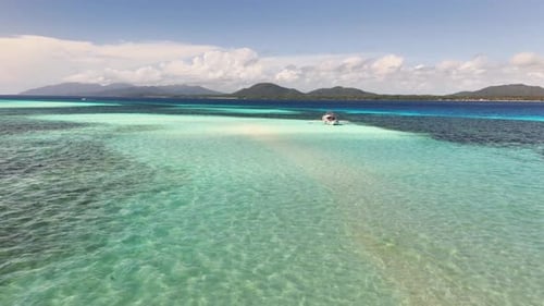 Crystal Clear Waters of Candaraman Sand Bar in Palawan, Philippines