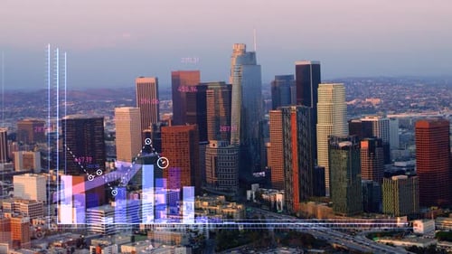 Corporate Double Exposure of Financial Graphs Rising in Front of Los Angeles,