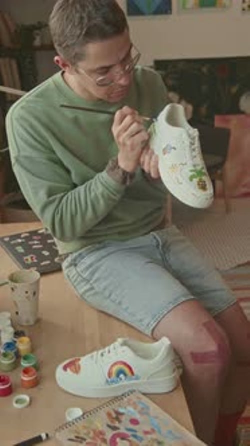 Fashion Designer Creating New Unique Custom Made Shoes in Studio