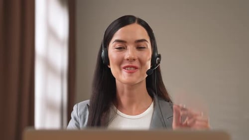 Female call center operator or customer service helpdesk staff. Blithe
