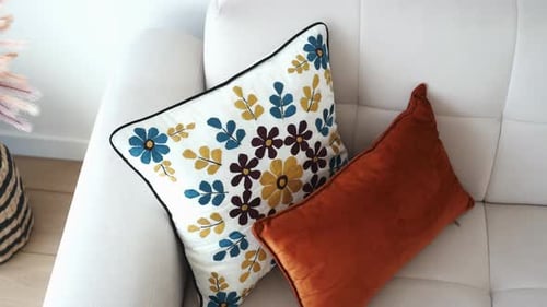 Cozy Home Interior with Decorative Pillows and Vase