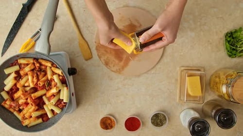 Grating Cheese for Pasta Dinner Preparation, Food