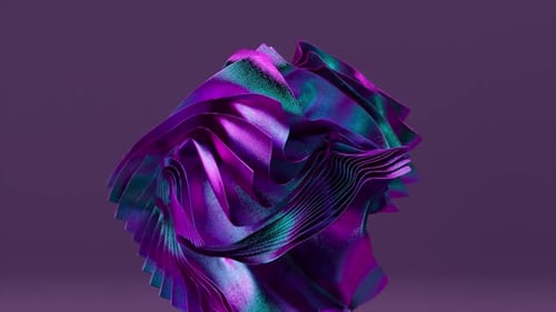 A Stack of Square Colored Pieces of Fabric Fan Out and Change Color Blue Purple Metallic Color Neon