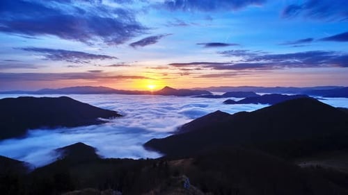 Majestic Mountain Sunrise with Cloud Inversion Time Lapse