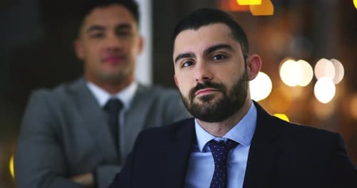 Face, team and business men in office, corporate company and workplace at night