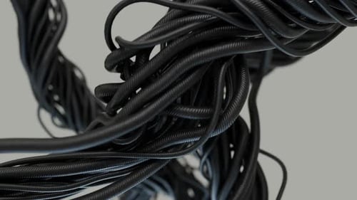 Close-Up View Of Numerous Flexible Black Cords