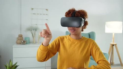 Woman Using Virtual Reality Headset at Home
