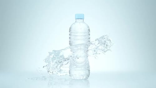 Water Splash Around a Plastic Bottle on White