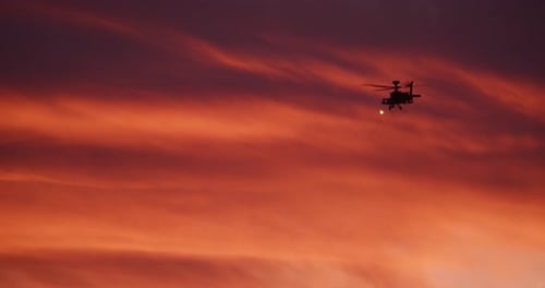 Helicopter Silhouette at Sunset