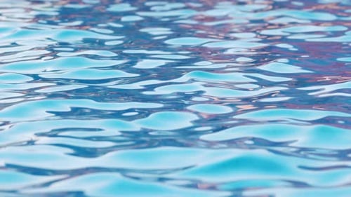 Pure Blue Water in Pool with Light Reflections