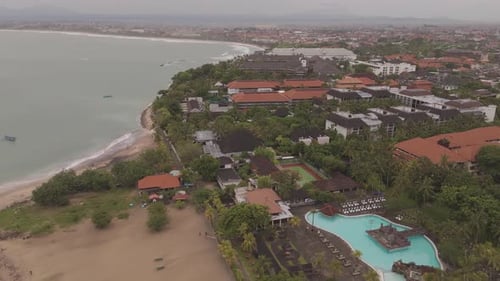 Stunning Aerial Drone Shot of Kuta, Bali – Sliding Left to Capture Breathtaking Coastal Views, Vibra