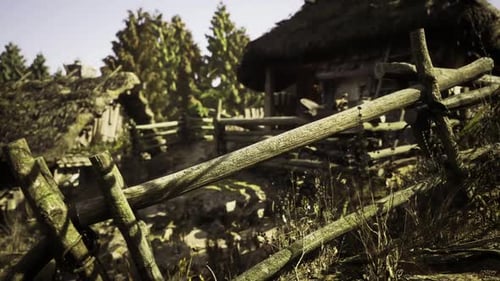 Rustic Wooden Fence in a Traditional Rural Village Landscape