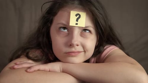 Schoolgirl Thinks About Tasks with Question