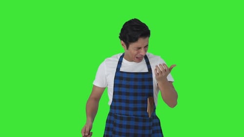 Indian cook tasting spicy food Green screen