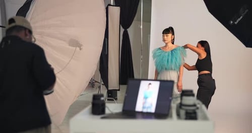 Model Posing for Fashion Photoshoot in Studio Setting