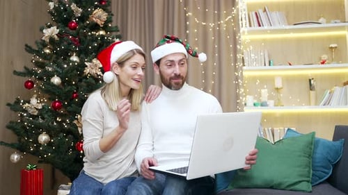 Couple Video Chatting at Christmas Time
