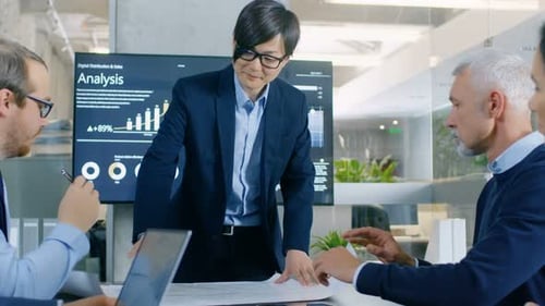 In the Conference Room Asian Branch Businessman Representative Spreads Market Expansion Project Blu