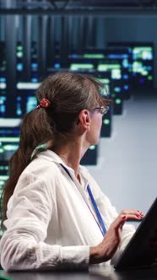 Woman Using Tablet at Futuristic Workplace