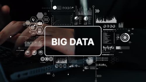 Escritura manual en un portátil con experiencia en Gráficos de Big Data y análisis digital en un espacio de trabajo moderno.