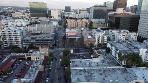 Beautiful golden hour aerial view of a dense city neighborhood in Los Angeles.