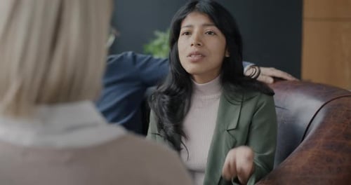 Woman Talking, Receiving Support in Office Setting